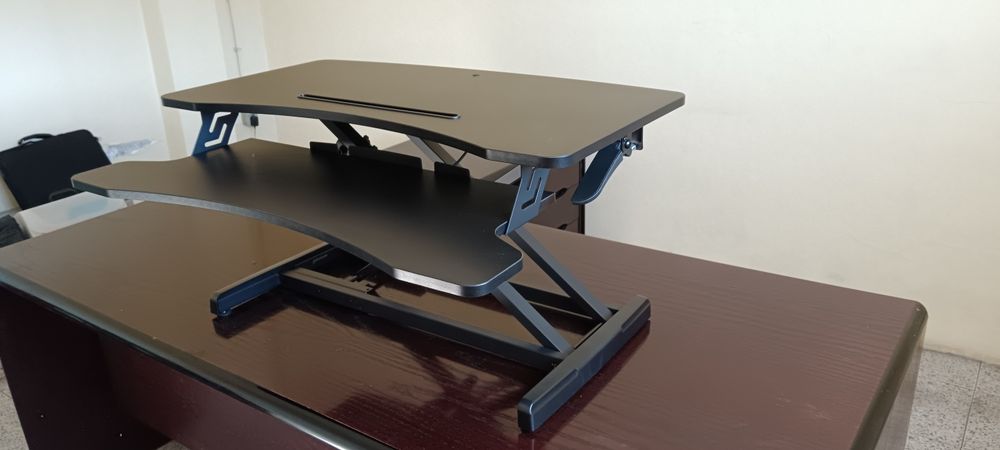 Plataforma de elevação para computador