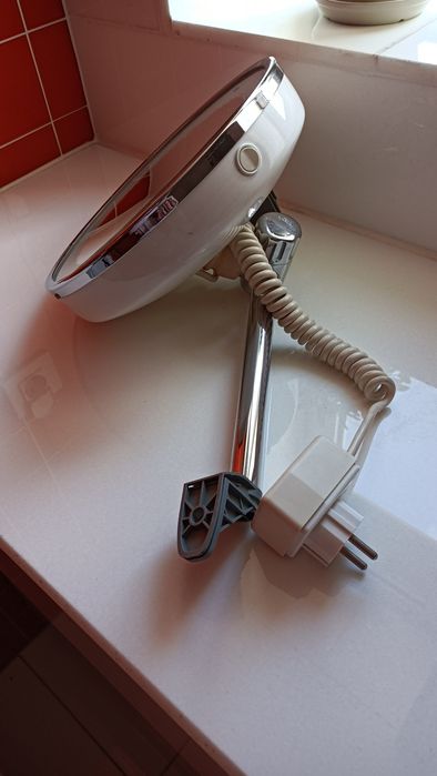 Espelho de aumento eléctrico