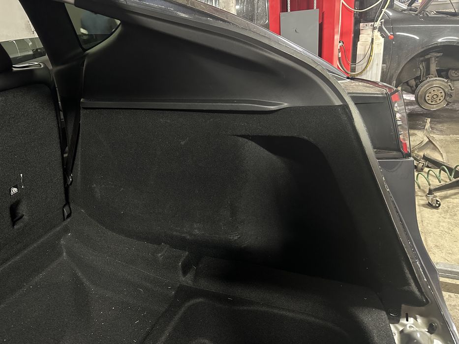 Tesla Model Y • обшивки багажника 2023-