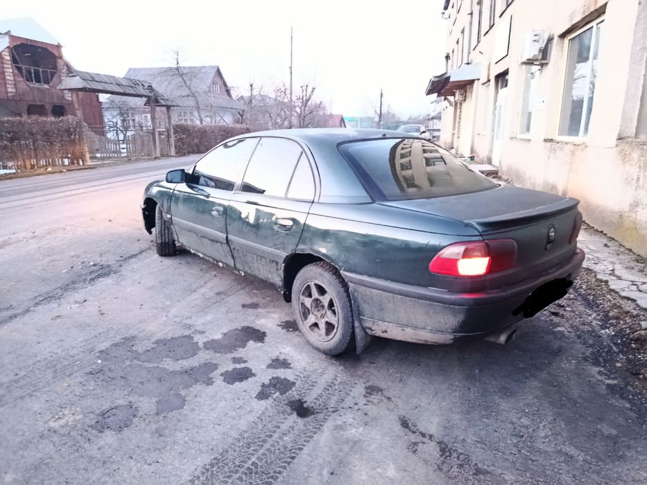 Омега б, Omega b