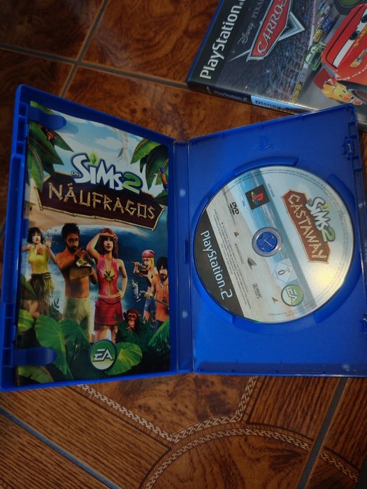 PS2 Slim + jogos + 2 comandos