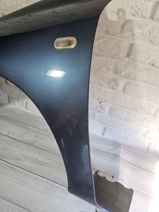 Оригінальне крило Ліве / Праве Honda Civic 7 EU