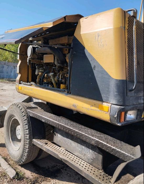 Продам екскаватор CAT