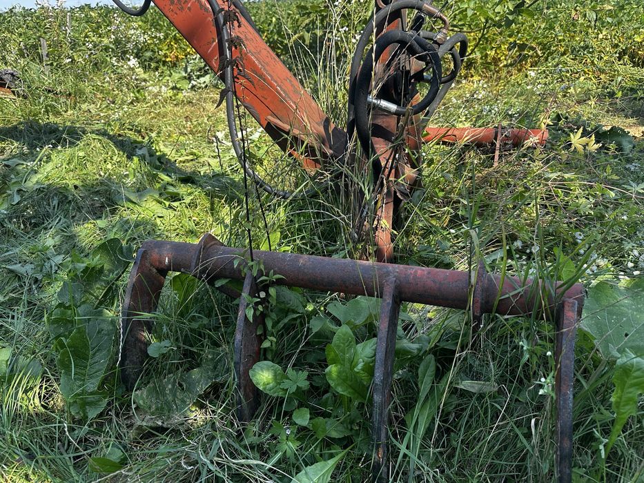 Грейферний навантажувач