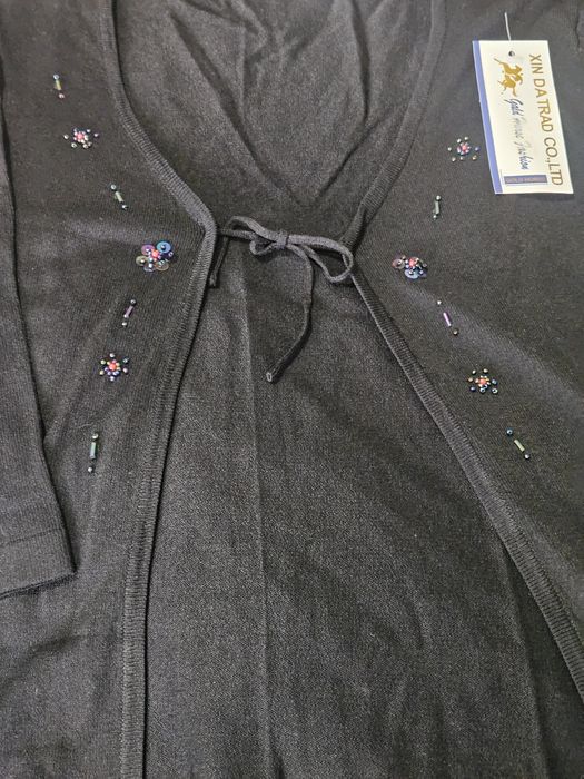 Conjunto de top e casaquinho em malha fina tam. S
