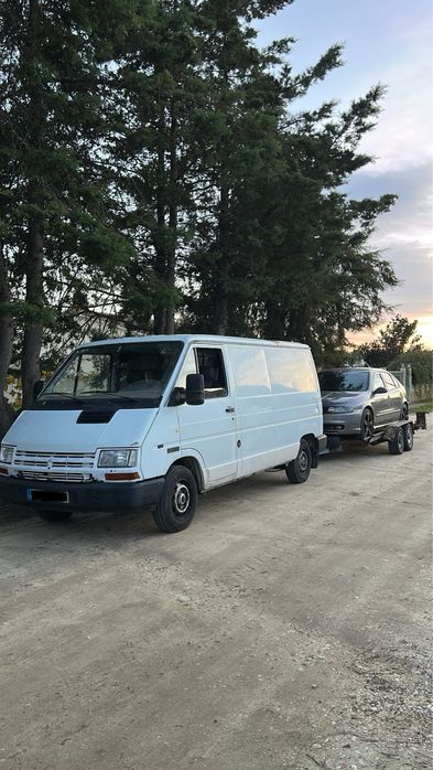 Serviços de transporte de veiculos e mercadorias