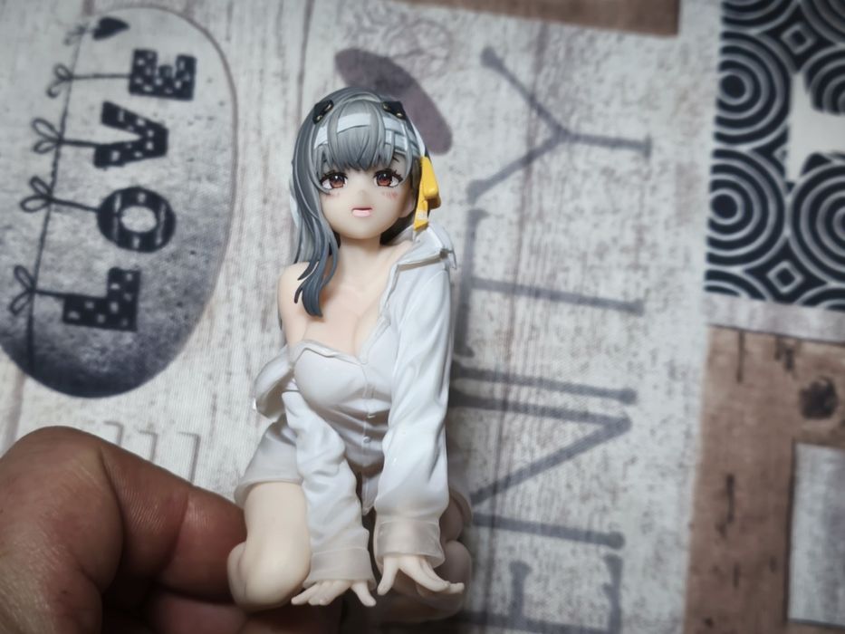 Figura Noodle Stopper da Goddess of Victory: Nikke.

- Design inspirad