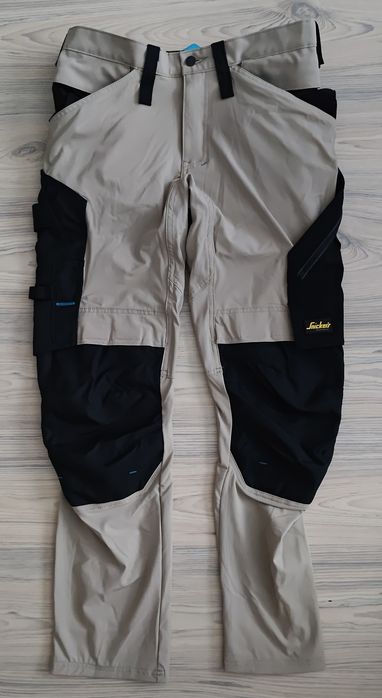 69 08 Snickers full stretch spodnie robocze z kieszeniami na lato do prac w wysokich temperaturach BHP 50 elastyczne pas 88 cm