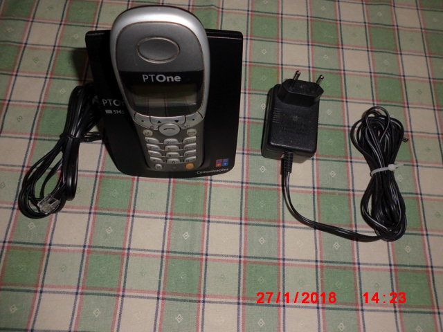 A cordless phone with a base station connected to the landline.64286377875457121