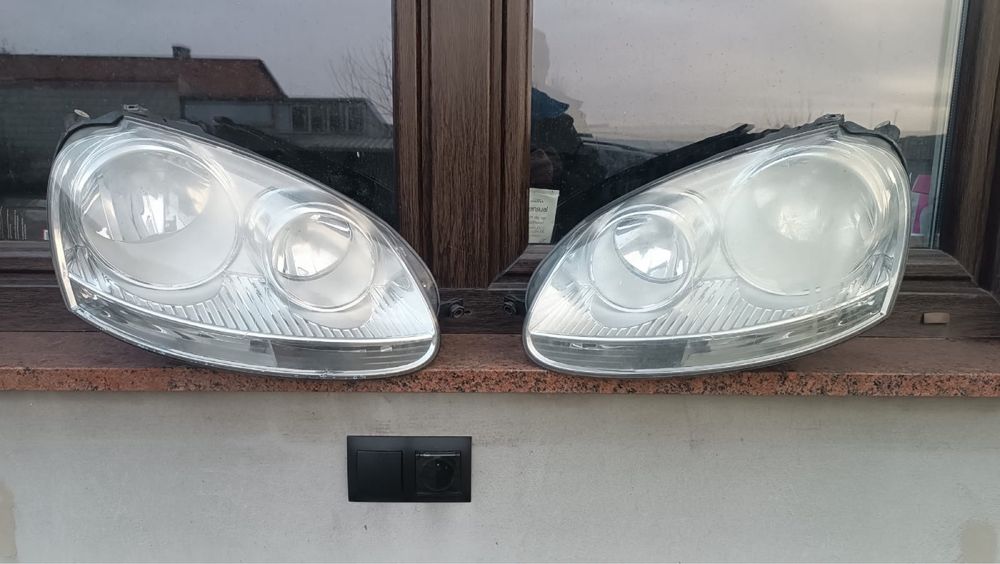Vw Golf V lampa przednia lewa prawa HELLA kompletna Europa