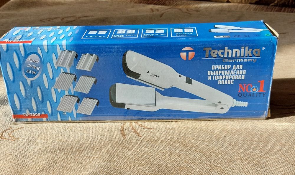 Прибор для выпрямления и гофрировки волос.