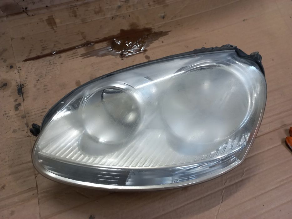 Lampa lewa przód przednia vw golf 5 V jetta