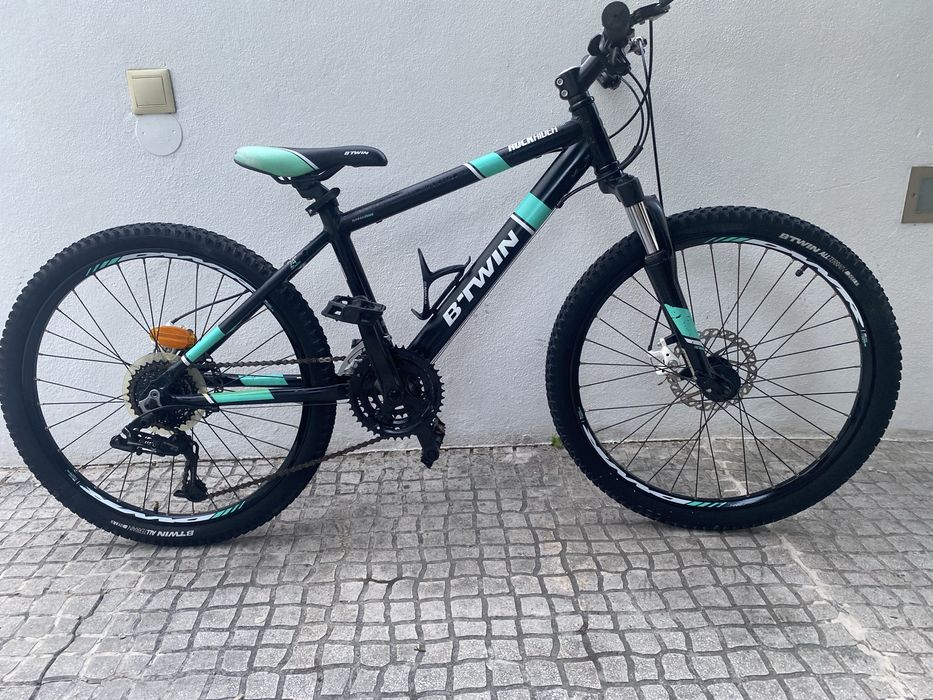 Bicicleta rockrider preta e azul turquesa roda 24