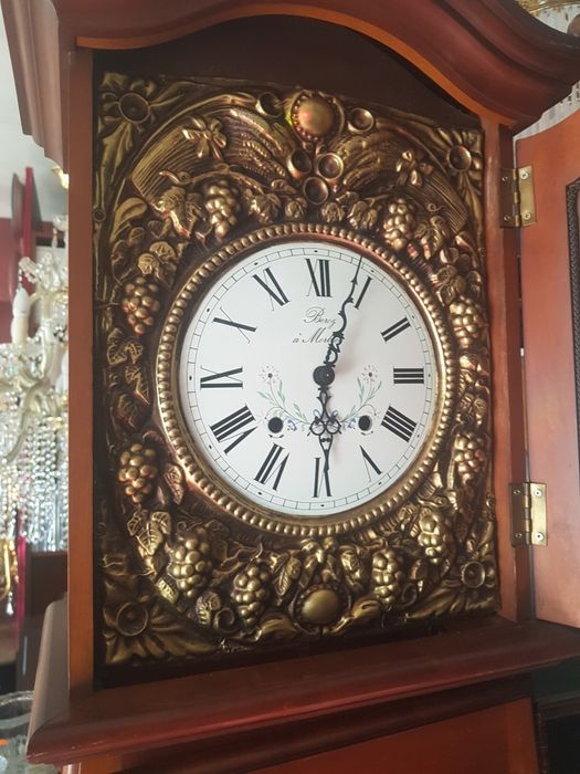 Relógio de coluna a corda