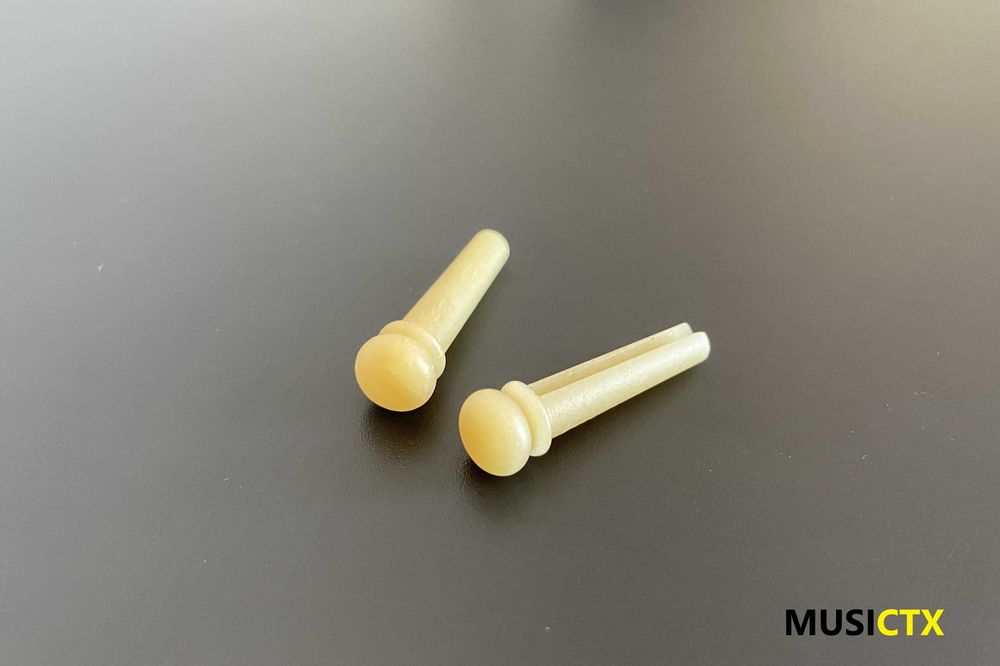 Pins em osso para guitarra folk