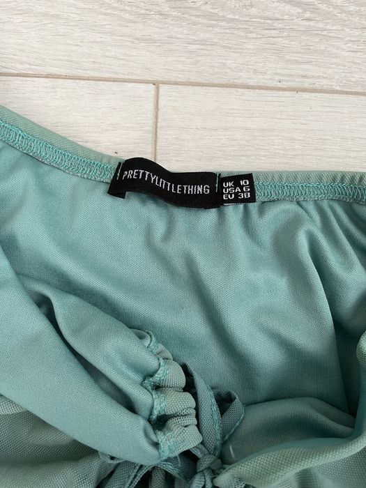 сукня сіро-блакитного кольору