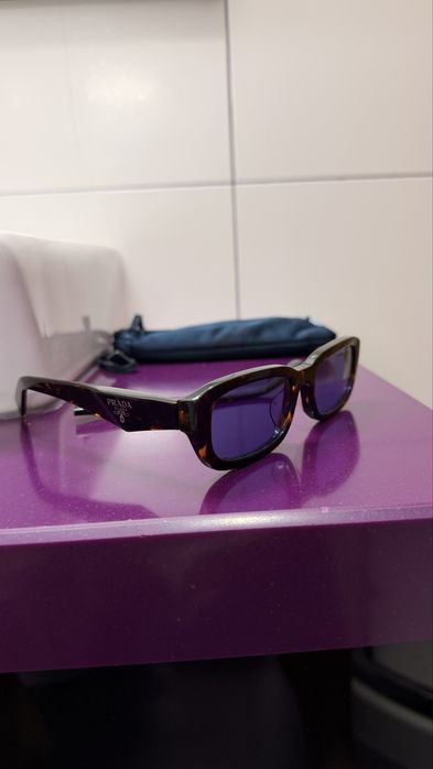 2 pares de oculos da prada