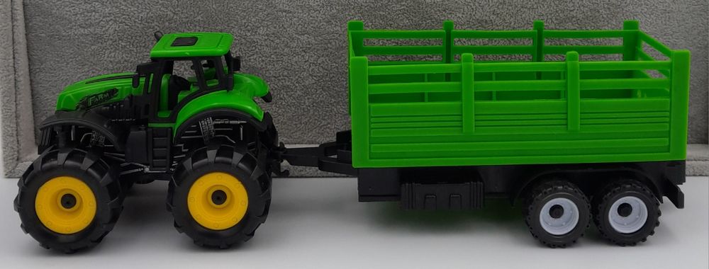 Traktorek Z przyczepa z napedem zamachowym