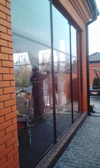 Прозрачные шторы из пленки Одесса от ветра , дождя, снега.