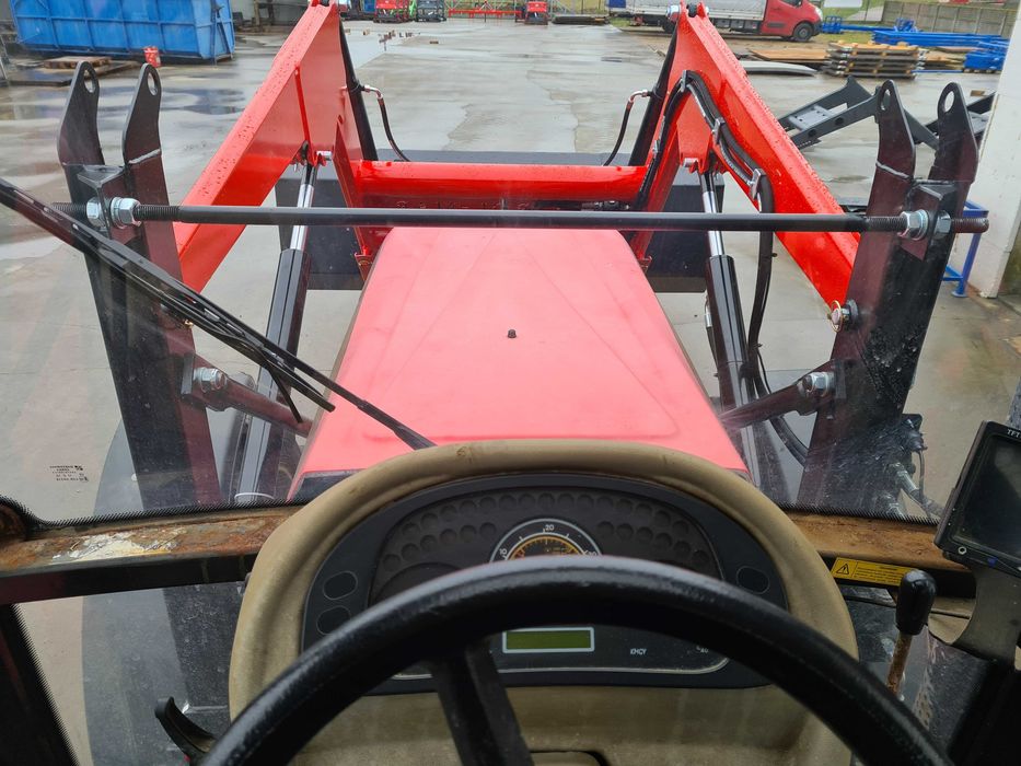 Tur, ładowacz czołowy Farmtrac 675 DT, 70 4WD. Montaż.