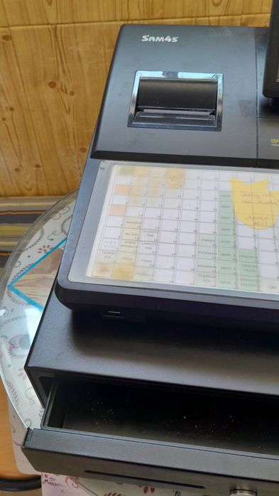 Maquina registadora a funcionar