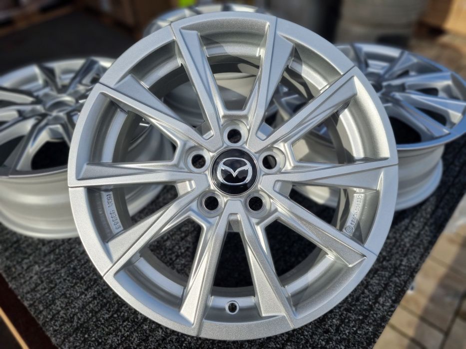 Felgi 15 " Mazda Mazda2 Hybrid XP210 [2021-obecnie) Nowe alu Srebrne