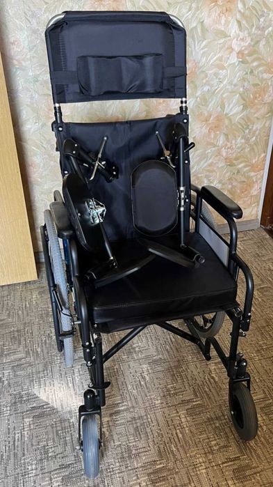 Новая инвалидная коляска.