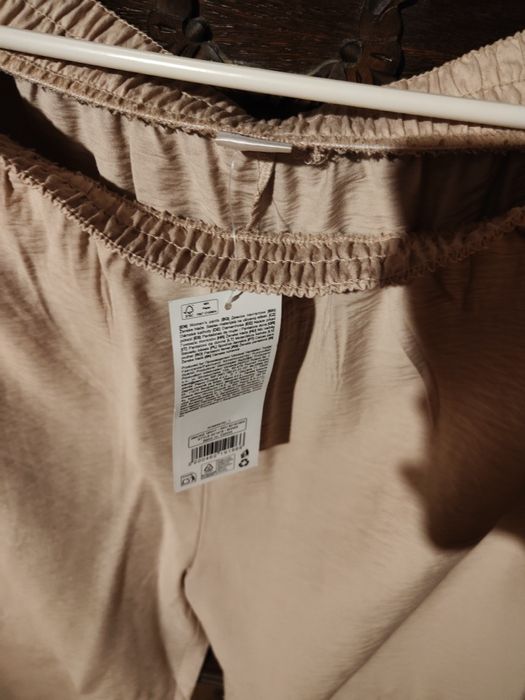 Beżowe letnie spodnie z szerokimi nogawkami 40/42 L/XL