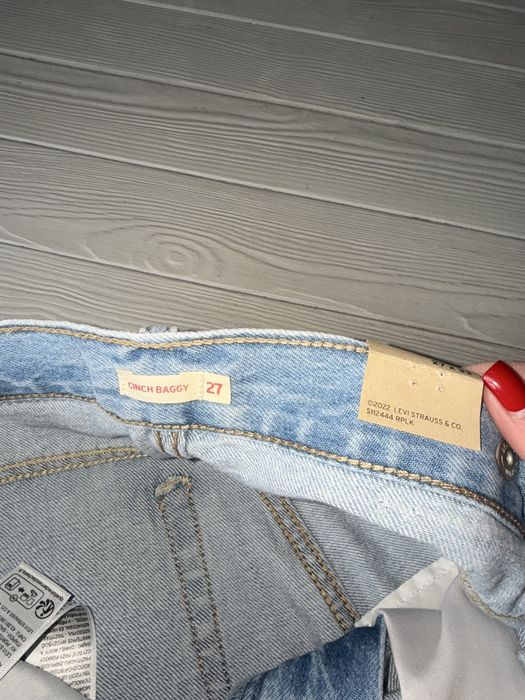 Оригінальні джинси Levi's CINCH BAGGY з регульованим поясом.