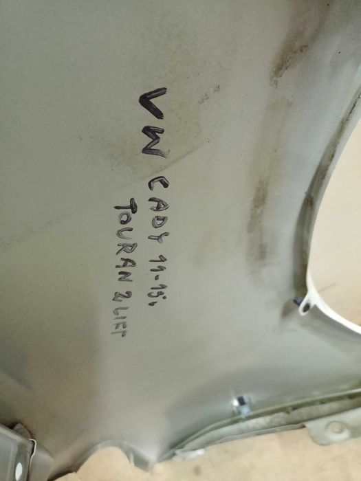 VW Caddy Touran 1 3 lift 2014r. błotnik lewy przód przedni biały