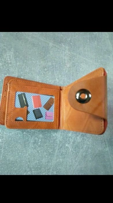 Brązowy portfel męski 100$