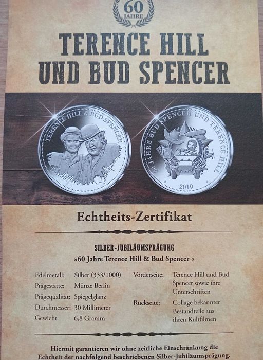 Srebrna moneta,certyfikat.