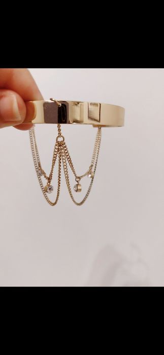 Pulseira para o braço dourada