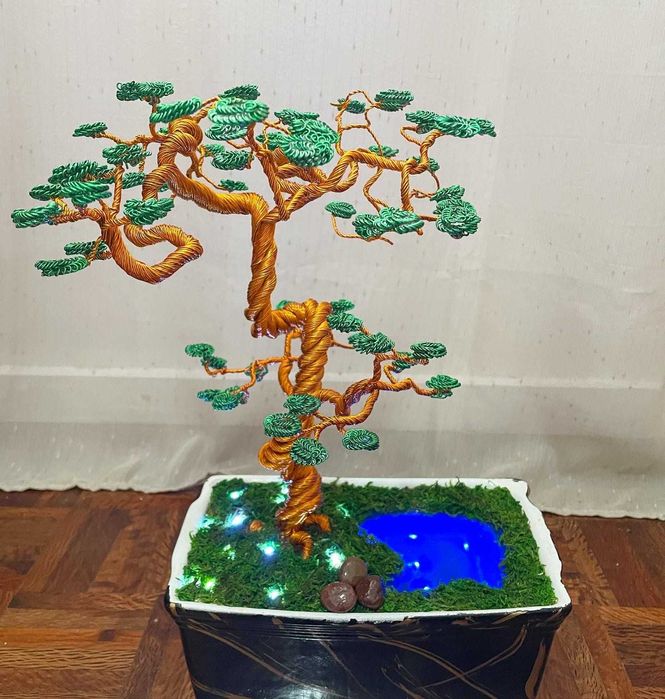 Artesanato feito com fios de alumínio