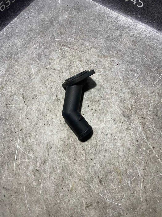 Кришка термостата фланець 1.6 MPI VW Skoda Audi Seat 06A121121C