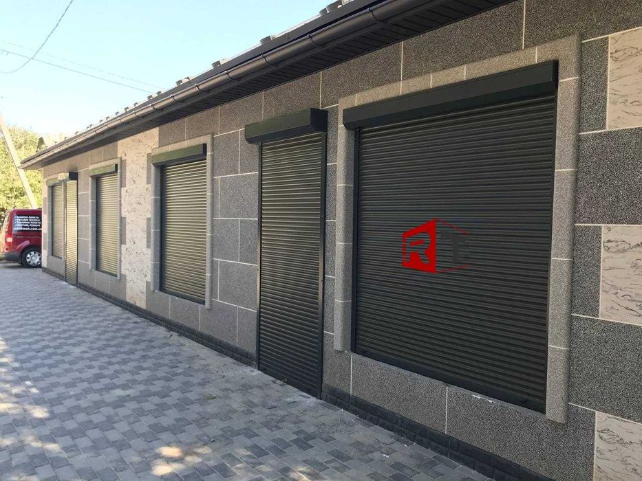 Захисні ролети на вікна. Ролети на двері. Ролетні ворота.