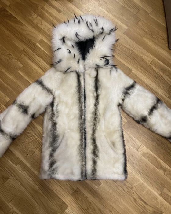 Біленька шуба