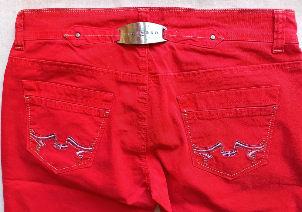 Жіночі джинси клеш Jonh Richmond. 29, 30 розмііри. Made in Italy.