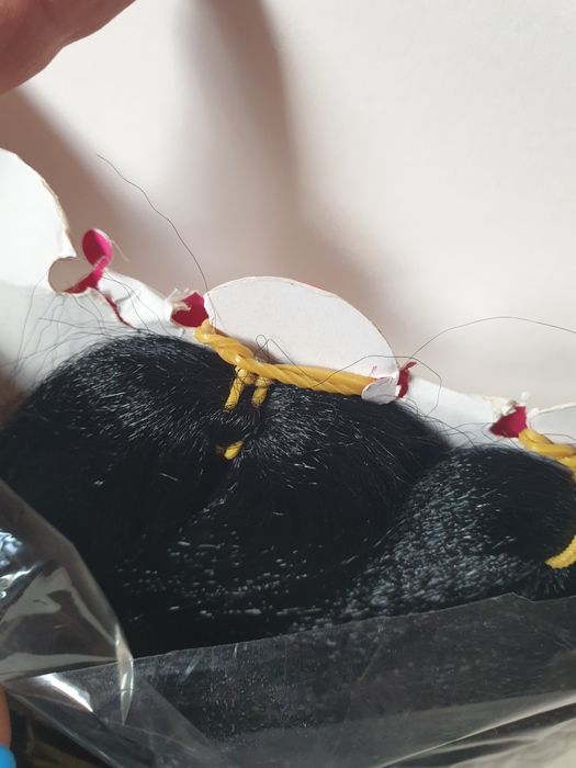 Волосы для плетения косичек.