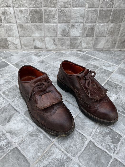 Sapatos de forcado em pele