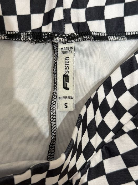 Стильні штани-кльош FB Sister в шаховий принт