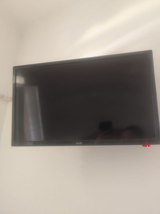 Televisão com apoio de parede