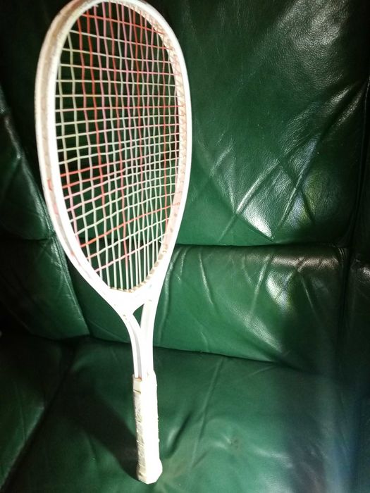 Raquete de ténis.