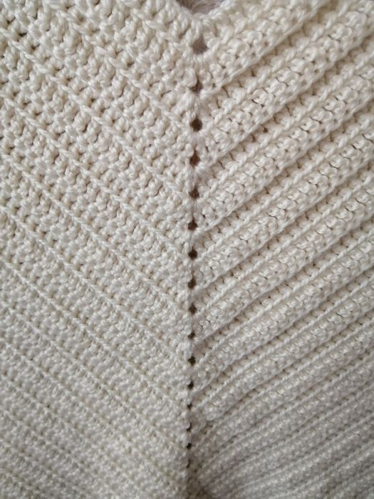 Poncho feito à mão