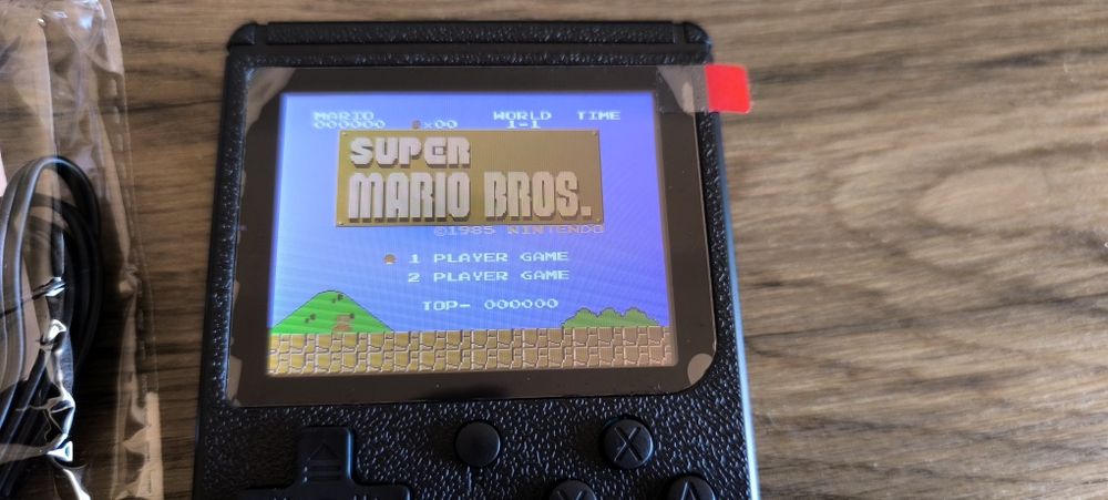 Consola retro tipo game boy com 500 jogos