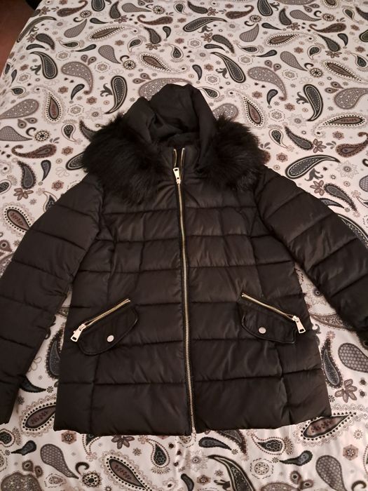 Quispo preto com carapuço