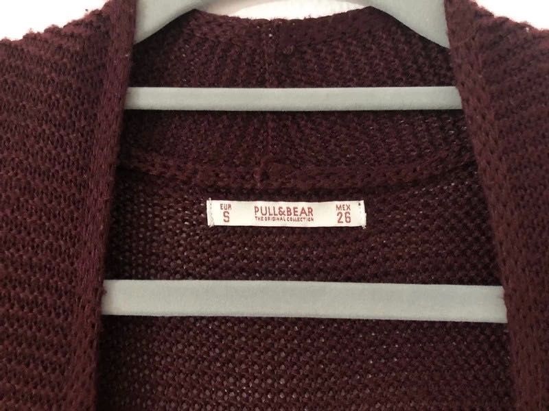 Cardigan malha bolsos