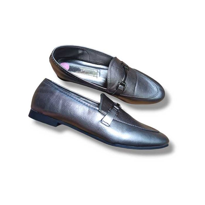 Сріблясті туфлі лофери
Claudia Ghizzani