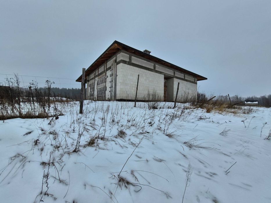 Działka z domem w stanie surowym – sprzedam