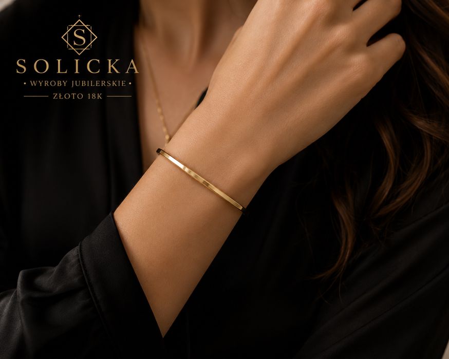 Złota bransoletka 750 (18K) sztywna koło waga 4,11 g
